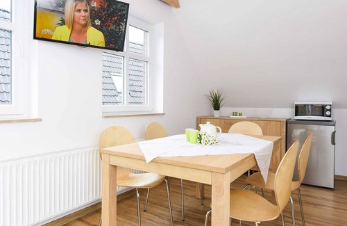 Neuharlingersiel Apartment | Ferienwohnung Flut - Meeresleuchten in Neuharlingersiel