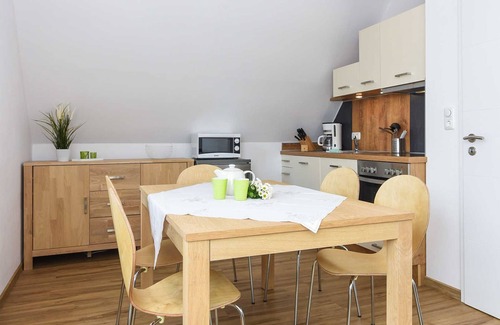 Neuharlingersiel Apartment | Ferienwohnung Flut - Meeresleuchten in Neuharlingersiel