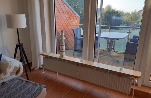 Westerdeichstrich Apartment | Fewo Schröder - BUDE 63a - mit Strandkorb am Meer - inklusive Bettwäsche und Handtücher