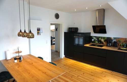 Thale Apartment | FeWo26 in Sagenharz | stylish family apartment, 2 bedrooms, air conditioning, WiFi & Netflix