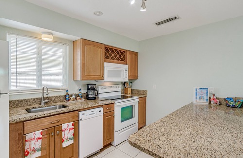 Cocoa Beach Cottage | Fiesta Flamingo Cottage Blocks to Beach & River ~ Kayaks and Bikes Provided!