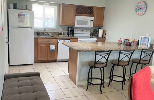 Cocoa Beach Cottage | Fiesta Flamingo Cottage Blocks to Beach & River ~ Kayaks and Bikes Provided!