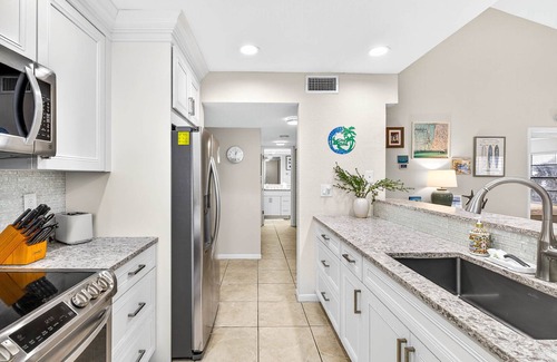 Clearwater Beach Condo | Fins up! | Condo Steps from the Sand