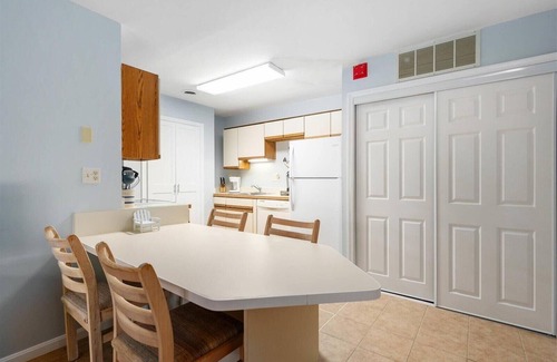 Caine Woods Condo | First Floor 2 Bedroom Condo with Private Courtyard & Outdoor Pool!