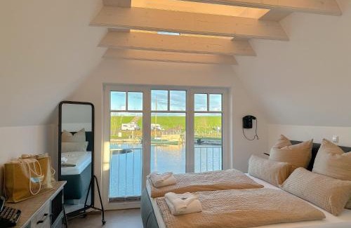 Neuharlingersiel House | Fischerhäuschen am Kurpark
