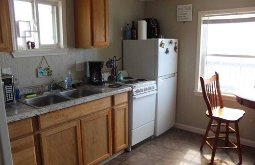 Cedar Lane Cottage | Fishing Cottage on ICW facing Sargentbeach with dock night fishing lights 2rooms
