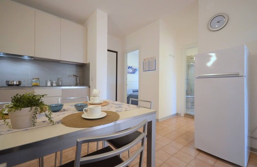 Bibione Apartment | Flat in a building with pool