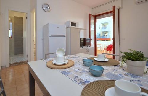 Bibione Apartment | Flat in a building with pool