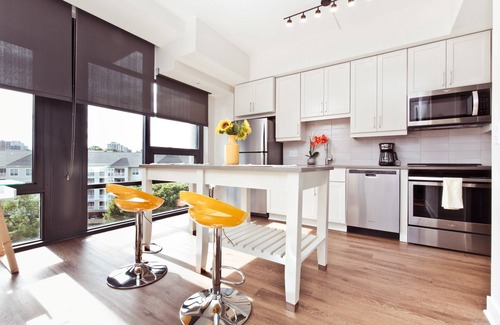 West End Apartment | floor to ceiling windows with views