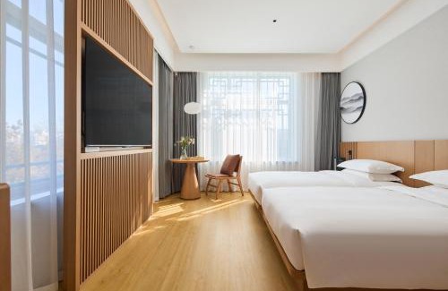 Yanji Hotel | Floral Hotel Banlan China Korean Folk Park