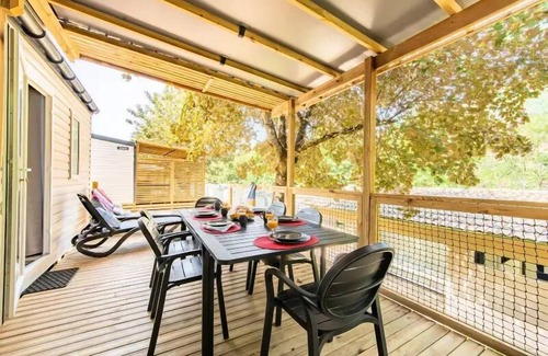Les Ollieres-sur-Eyrieux House | Flower Camping Mas de Champel * - Mobile-Home 30m2 Premium - 2 bedrooms - Covered terrace - CLIM + TV + sheets + towels included 4 people