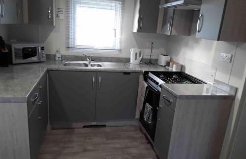 Carlisle House | Forestbrook - Cheerful two bedroom tiny house
