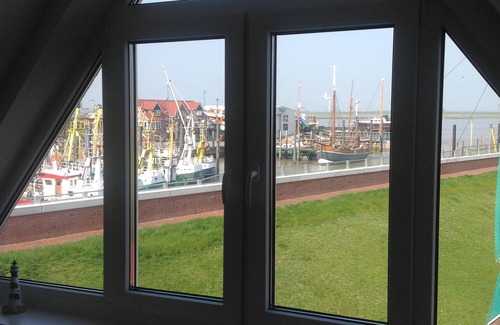 Ditzum House | Four stars at the harbor: Modern renovated fisherman's house directly at the Ditzumer harbor