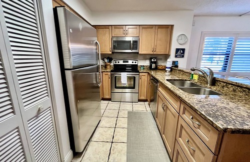 Butler Beach Condo | FREE FUN during your stay in this Gold-rated condo with beautiful ocean view and easy access to the pool and beach!