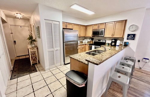 Butler Beach Condo | FREE FUN during your stay in this Gold-rated condo with beautiful ocean view and easy access to the pool and beach!