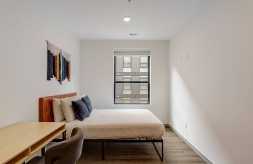 Downtown Lincoln Apartment | Frontdesk | 4 BR Apt by Nebraska History Museum