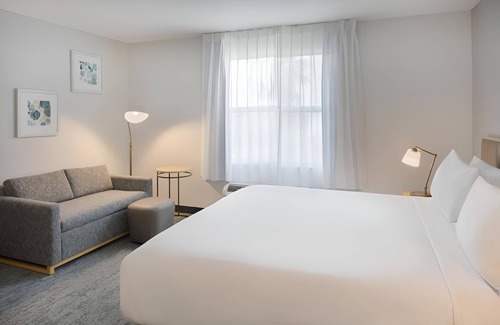 Westshore Hotel | Fully Equipped Kitchen in Modern Suite with Airport Shuttle and Swimming Pool