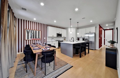 Bryan House | Gameday Oasis – Hot Tub Fire Pit Mini Golf