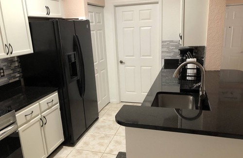 North Naples Condo | Gated community in the center of everything beautiful resort style pool spa gym