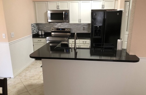 North Naples Condo | Gated community in the center of everything beautiful resort style pool spa gym