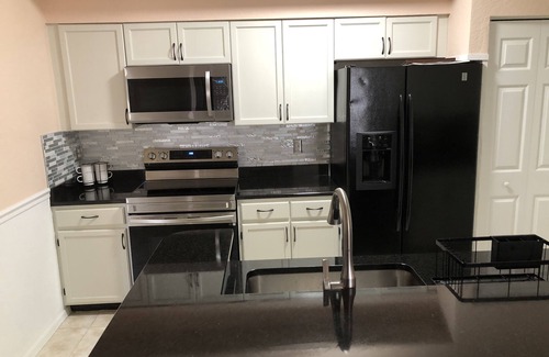 North Naples Condo | Gated community in the center of everything beautiful resort style pool spa gym