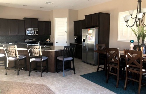 Estrella Mountain Ranch House | Gated Golf Course community with beautiful backyard oasis!