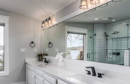 Rogers House | Gated home, right on the water, minutes from downtown Rogers!