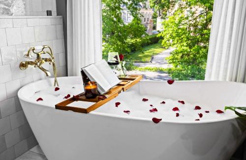 Cherokee Triangle House | Gatsby Estate Luxe 7BR Retreat with Game Room