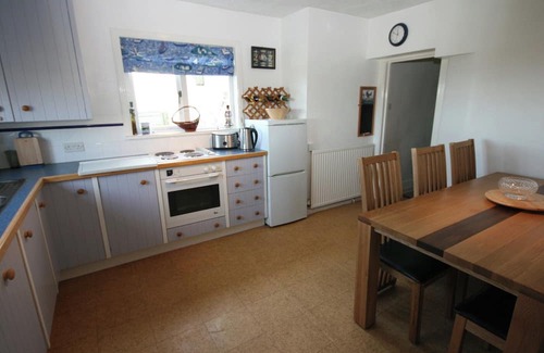 Southerness Cottage | This beach front cottage oozes charm, in a stunning location with sea views.