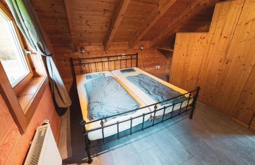 Nassau House | Gemütliches Holzhaus bis 12 Schlafplätze