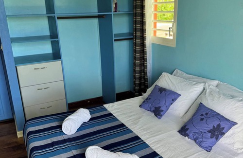 Capesterre-Belle-Eau Bed & Breakfast | Get away from it all: bedroom in architect-designed house with sea view!