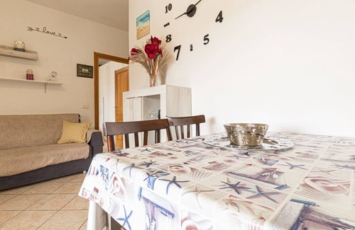 Seccheto Apartment | Ginevra Apartment in Seccheto, with equipped porch with splendid sea view, close to the center and t