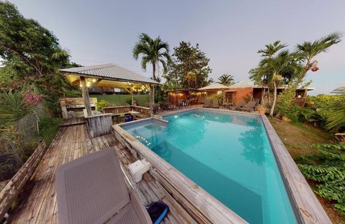 Sainte-Anne House | Gîte Baobab 1: Beautiful pool area with panoramic view