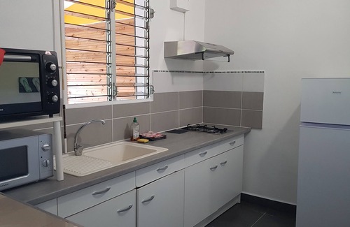 Sainte-Anne Cottage | Gîte gwada mango T2 air-conditioned 150m from the beach, swimming pool, patio