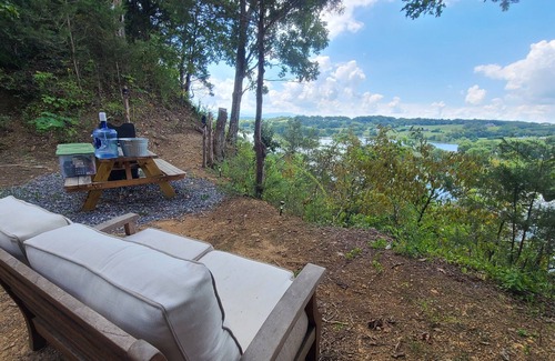 Morristown Cabin | GlampVentures "Helluva View" Bunkhouse with Nolichucky River & Smoky Mtn Views.