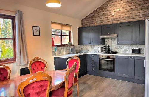 Llanybri Ski Chalet | Goldcrest 4-Hot Tub-Woodland Lodges-Carmarthenshire-Tenby