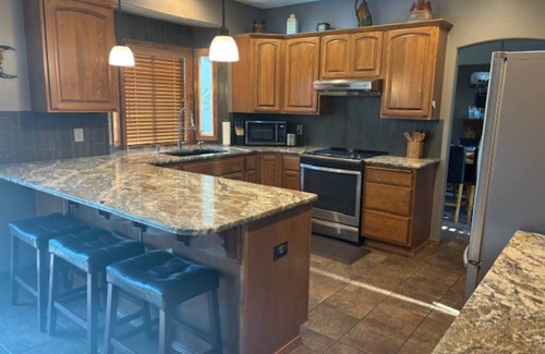 Spokane House | Gorgeous Executive Home - Hot Tub, Gym, Theatre, and More!