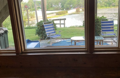 East Harwich Apartment | Gorgeous lake beachfront private apartment with canoe, kayaks, & home theatre