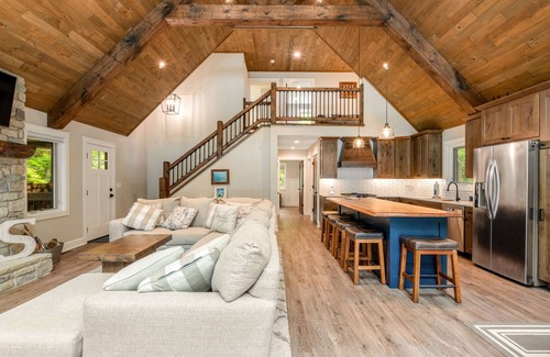Lac du Flambeau House | Gorgeous lakefront home with private dock, canoe, kayak, firepit & fireplace