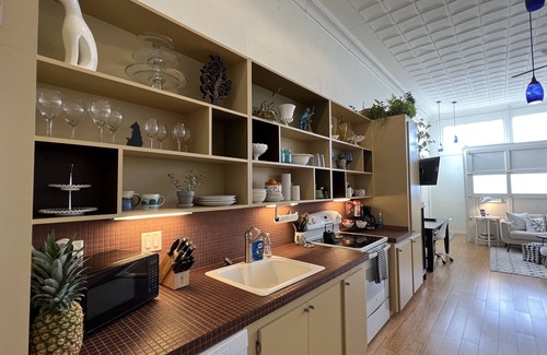 Brownwood Apartment | Gorgeous loft in historic building near HPU, restaurants, shops.