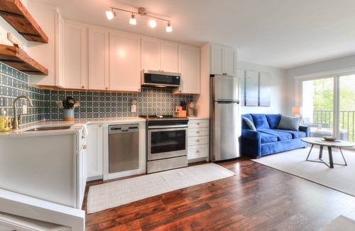 The Pines Condo | Gorgeous renovated property in town & walking distance to the beach & shops