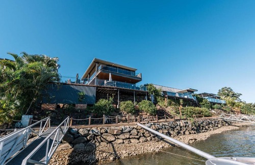 Oxenford House | Gorgeous Riverfront 5BR House with Pool