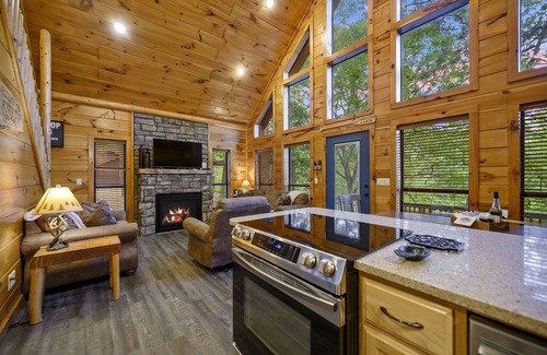 Broken Bow Cabin | Grandview ~ Riverfront with play set, hot tub, kayaks and outdoor patio