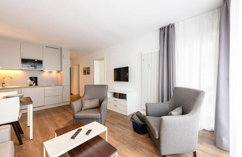 Bensersiel Apartment | Great 3-room vacation apartment in a quiet location with south-facing terrace near the beach -