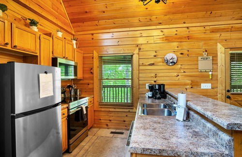 Sevierville Cabin | Great Cabin sleeps 8, New Furnishings, Loft w/Arcade Games, Hot Tub & Fireplace