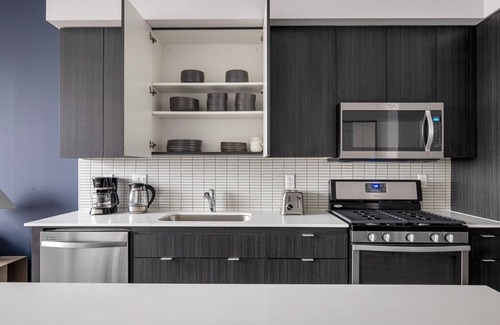 The Loop Apartment | Great South Loop 1BR w/Games & Pool, nr Park & Train, by Blueground