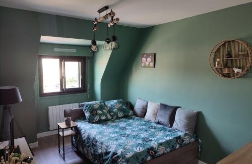 Louviers Apartment | Green cosy