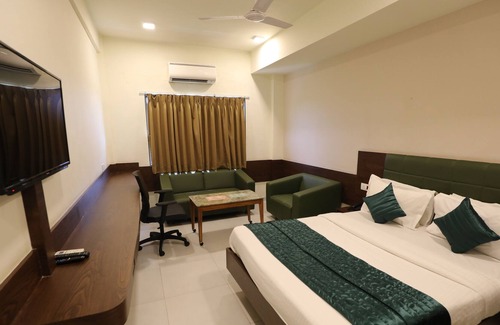 Adajan House | GreenOtel Room Surat