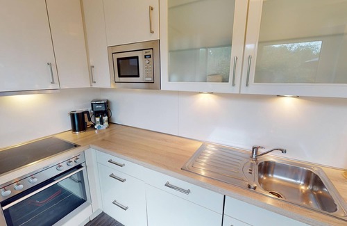 Pelzerhaken House | Großes 8-personen Ferienhaus und Hund mit Kamin, Sauna und Garten in Strandnähe