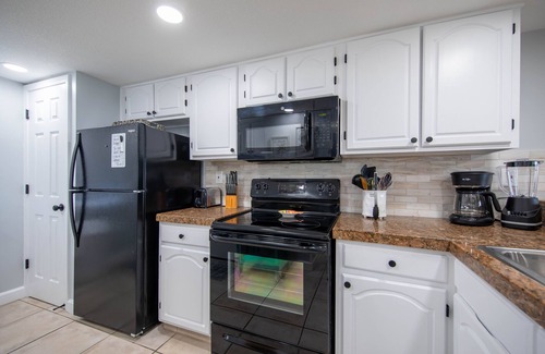 Lower Grand Lagoon Condo | Ground Floor 3BR 3BA Walk directly out to the pool and Beach* No Elevator